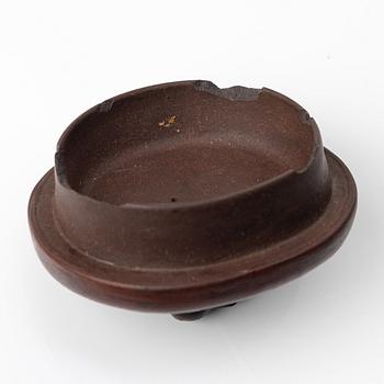 A Chinese 'hundred-fruit' yixing teapot, Qing dynasty (1644-1912).