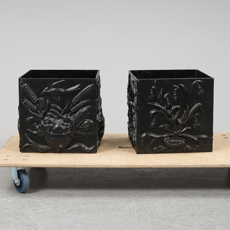 A pair of cast iron garden plant pots, 20th Century.