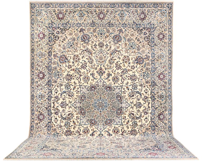 A Nain, part silk carpet, c. 474 x 322 cm.