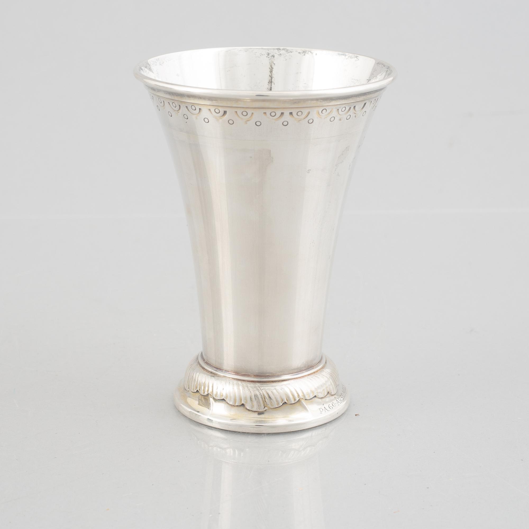 A set of three Swedish silver beakers, including CG Hallberg, Stockholm 1951.