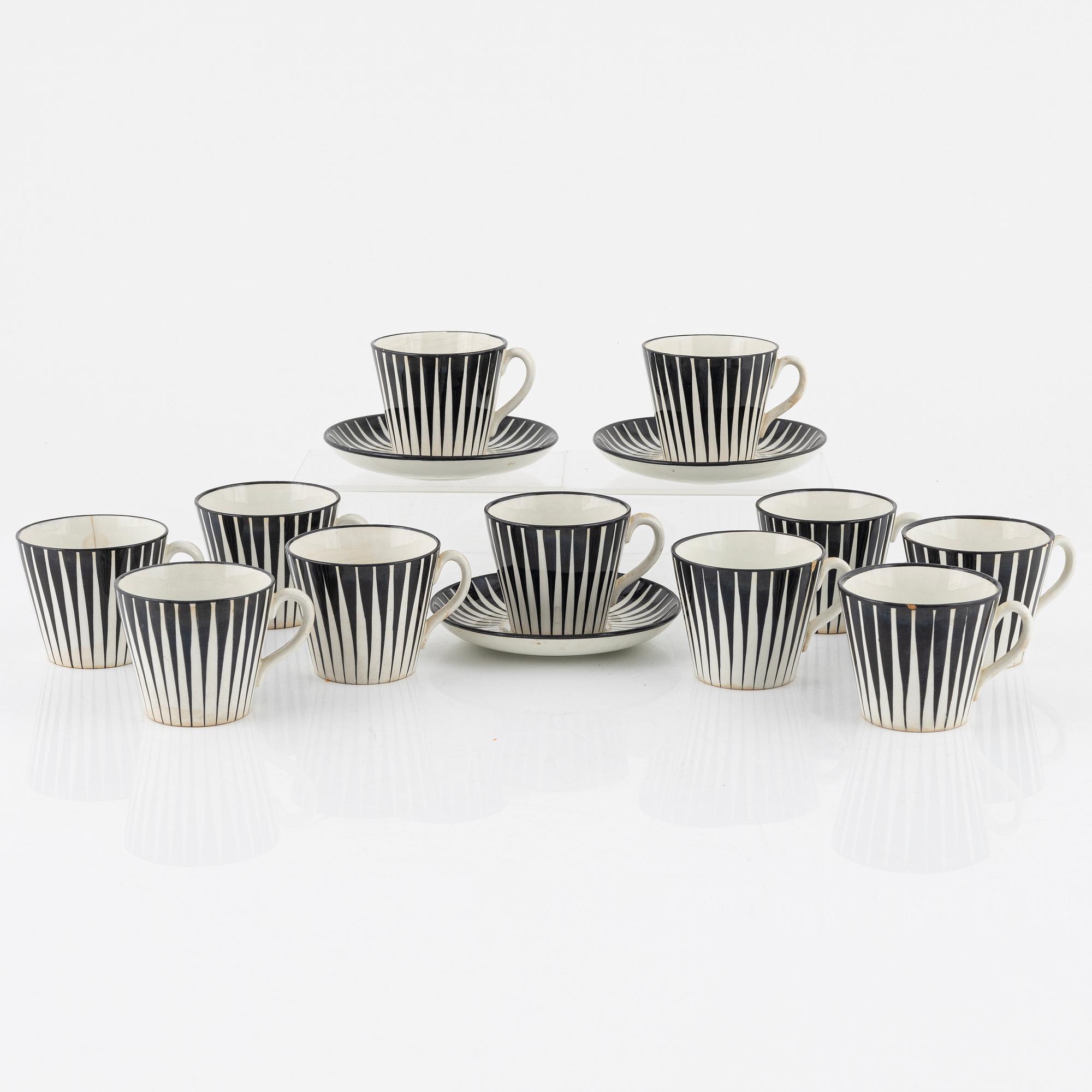 Eugen Trost, eleven coffee cups with three saucers, 'Zebra', Upsala-Ekeby Gefle.