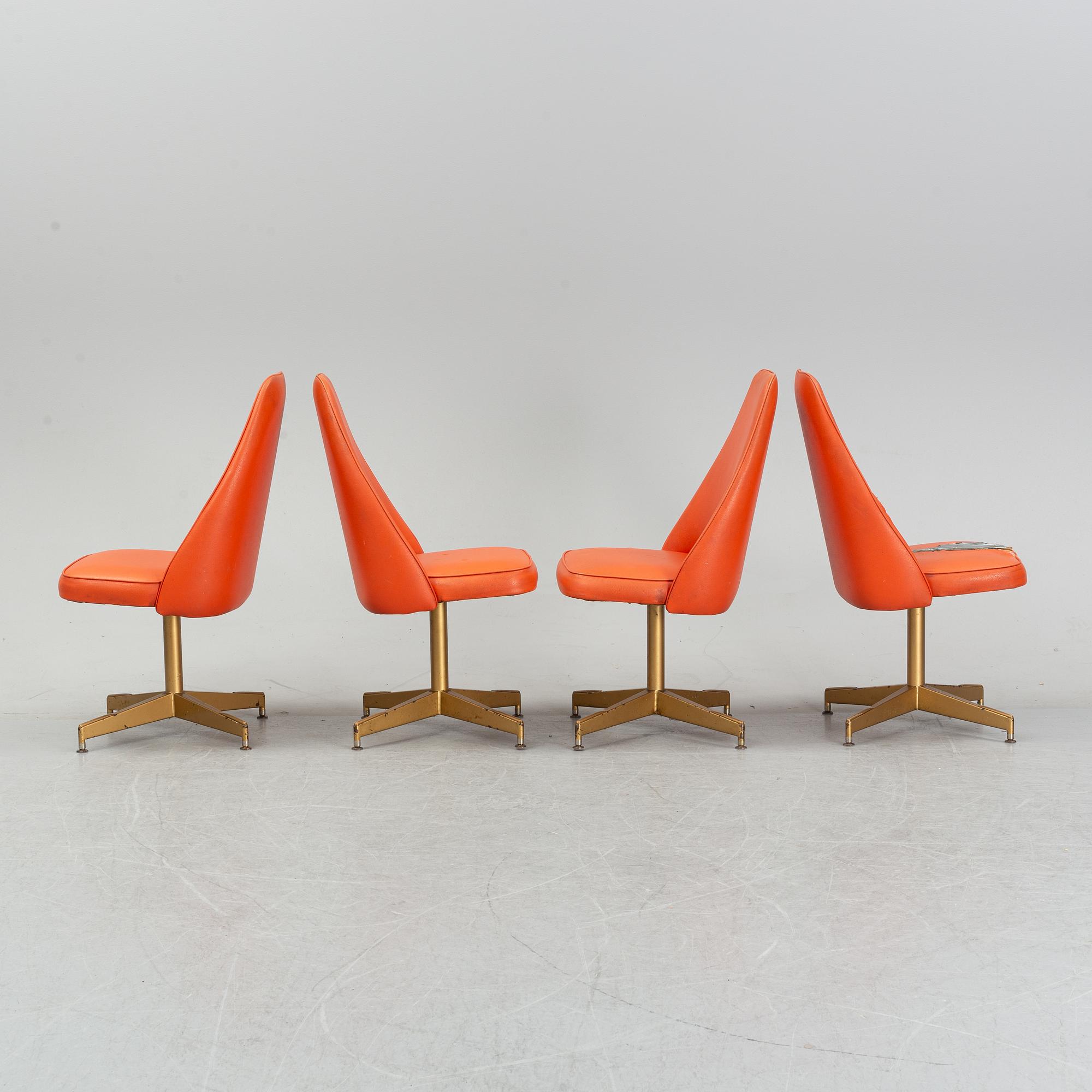 A dining table with four chairs, Walter of Wabash, table dated 1960.