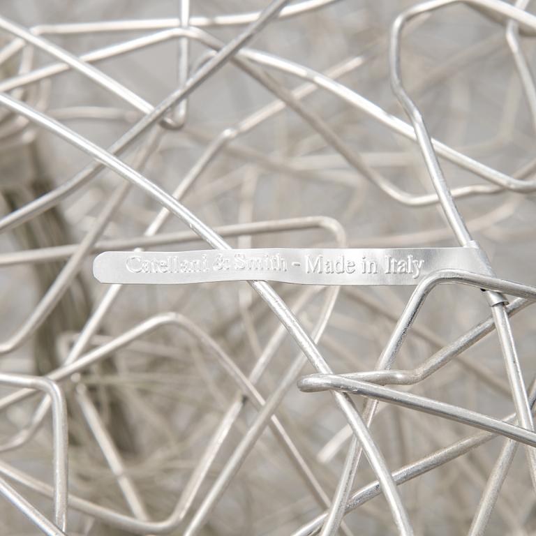 A 'Fil de Fer Ovale' ceiling light by Enzo Cattelini.