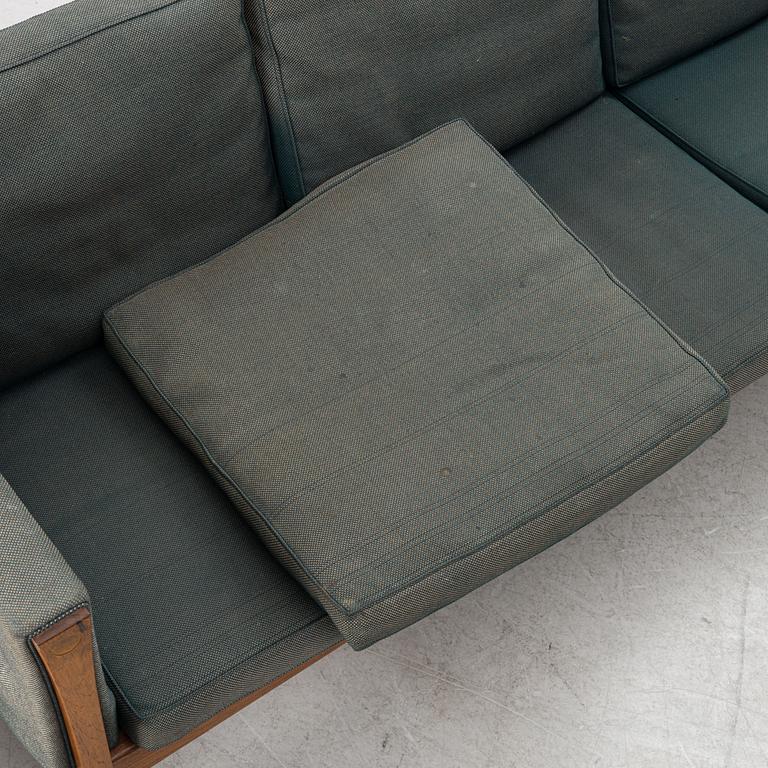 Hans J. Wegner, a model AP62/4 sofa and model AP62/1 armchiar,