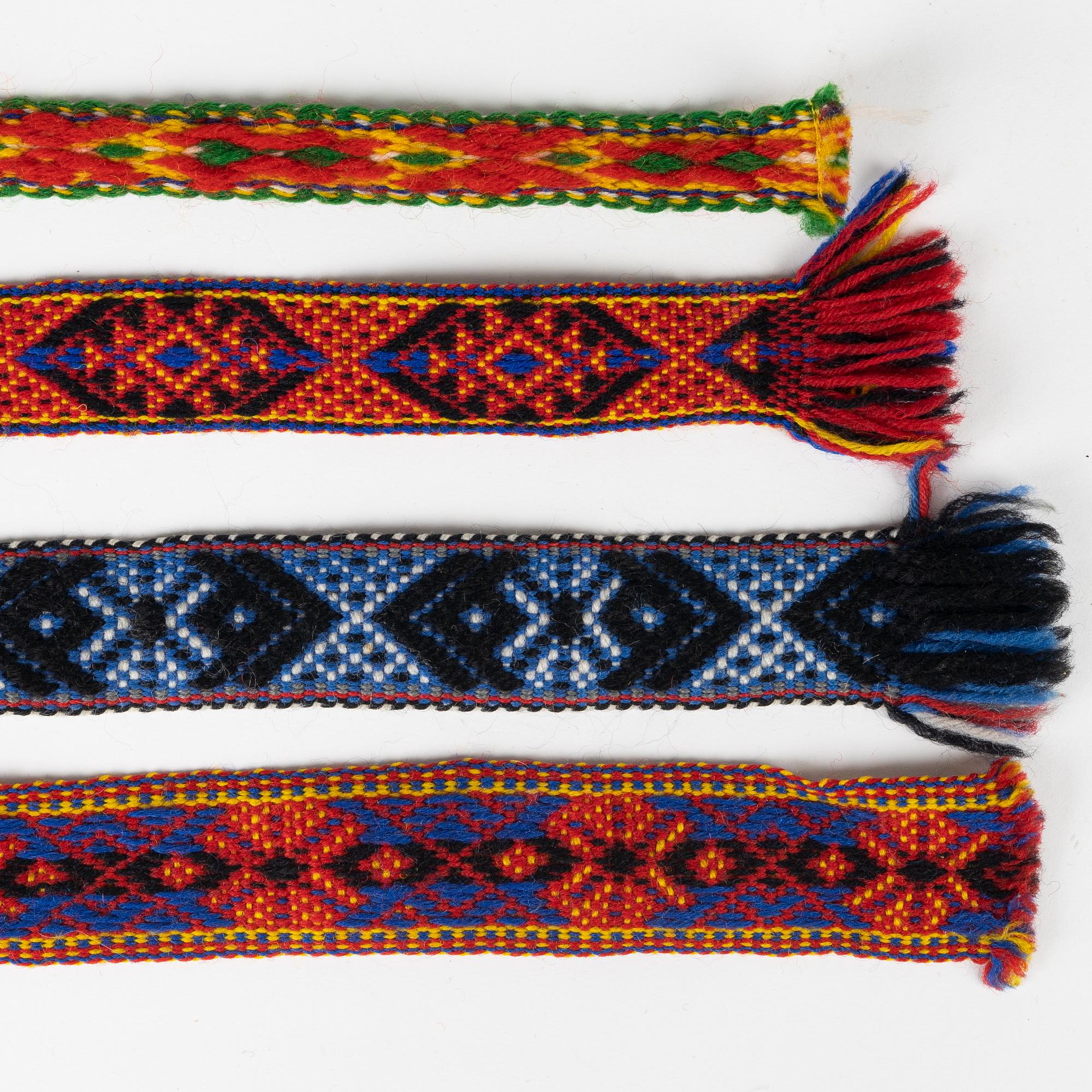 Twelve woven multicoloured bands, 20th Century.