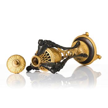A French gilt and patinated bronze Empire-style brûle-parfum, later part 19th century.
