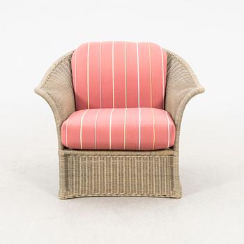 A Bonacina special edition rattan armchair 21st  century.