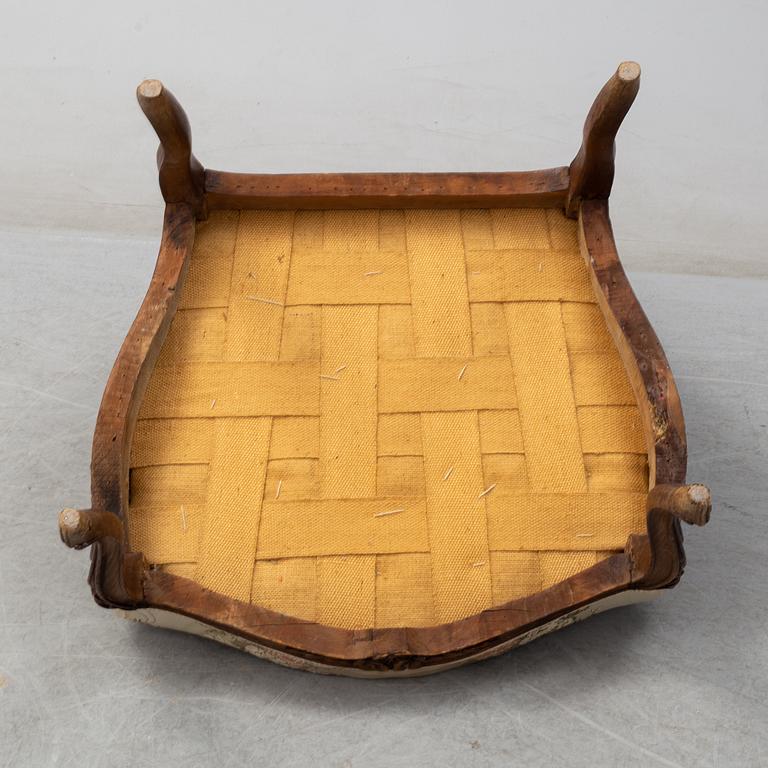 A mid 18th century Rococo arm chair.