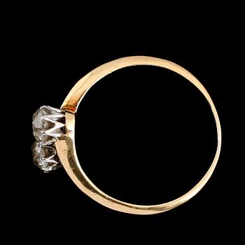 RING, 18 k guld, med 2 diamanter, tot ca 0.50 ct enl gravyr, 1900-talets första hälft.