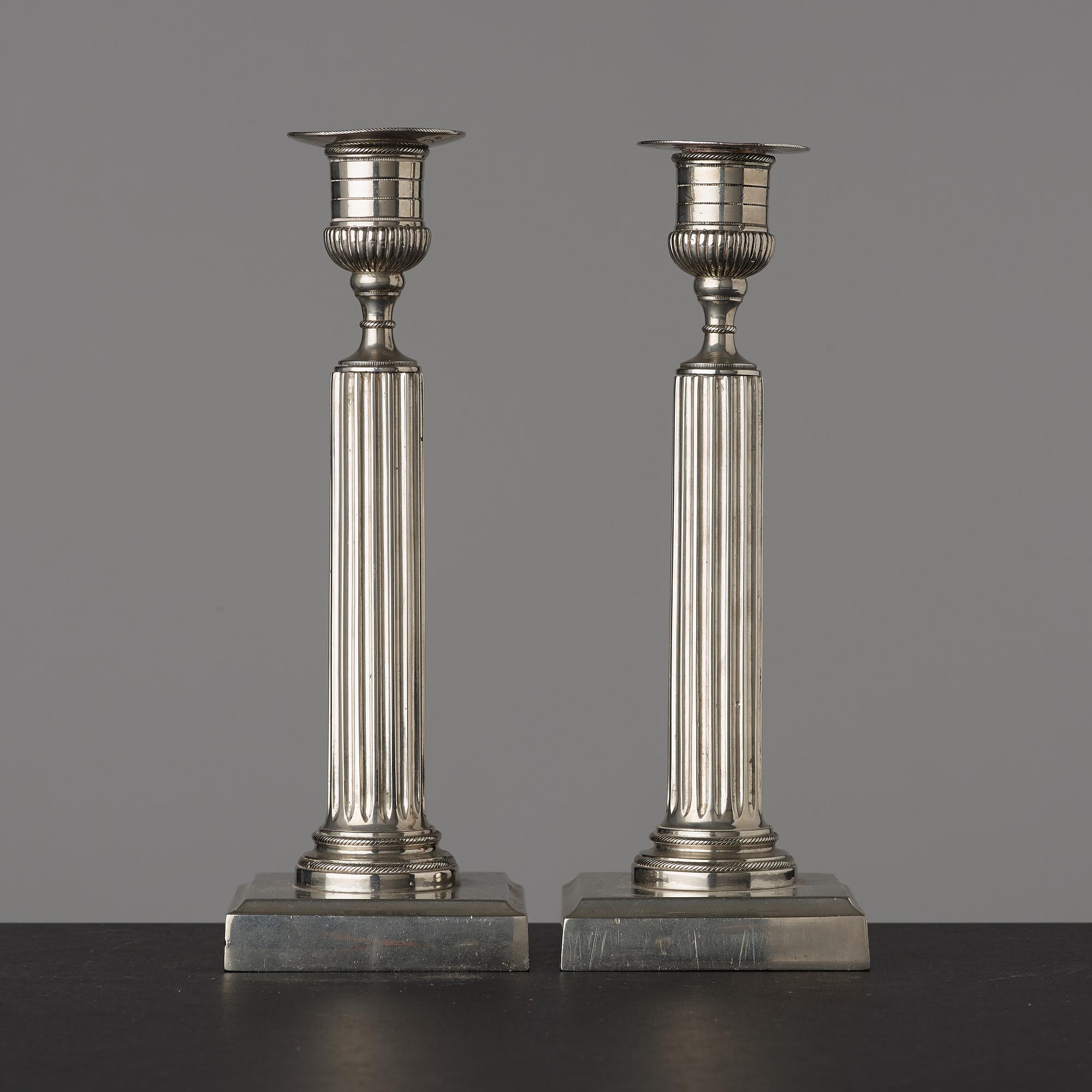 A pair of Gustavian white metal candlesticks by Isak Gråsten (1770-1821), Wedevågs Bruk.