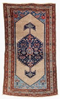 An oriental rug, c. 175 x 102 cm.