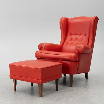 Carl Malmsten, a model 'Häggbom' armchair with ottoman, Sweden.