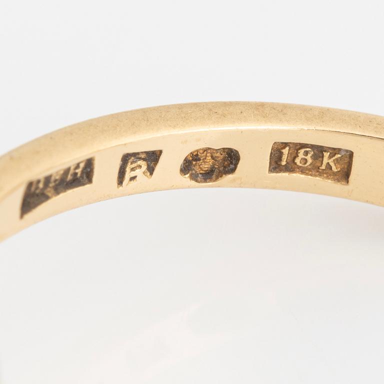 Ring, 18K gold with faceted white stones.