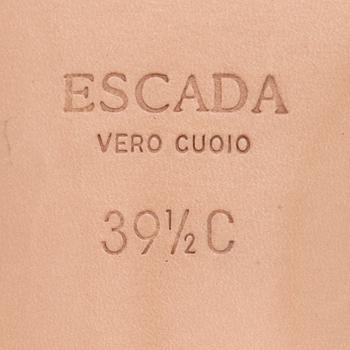 ESCADA, a pair of jeanscloth slip-in.