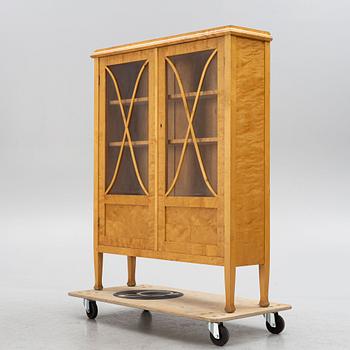 A 1910's/20's vitrine cabinet.