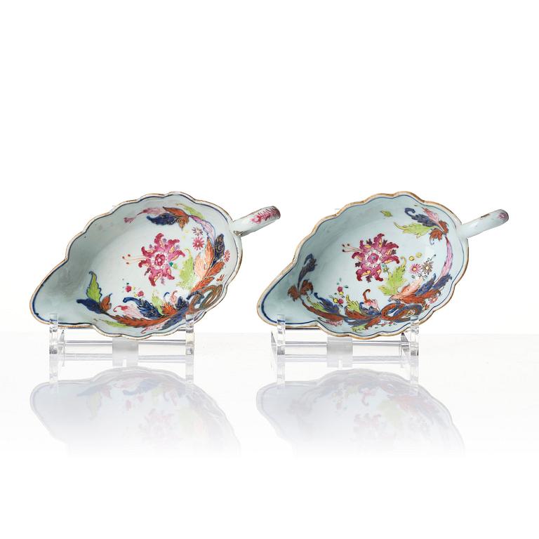 A pair of famille rose pseudo tobacco leaf sauce boats, Qing dynasty, Qianlong (1736-95).