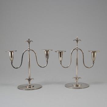 a pair of Elis Bergh silver plated candelabras, Swedish grace, CG Hallberg, Stockholm, 1920s.