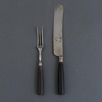 A set of 10 19th century forks and 10 knives.