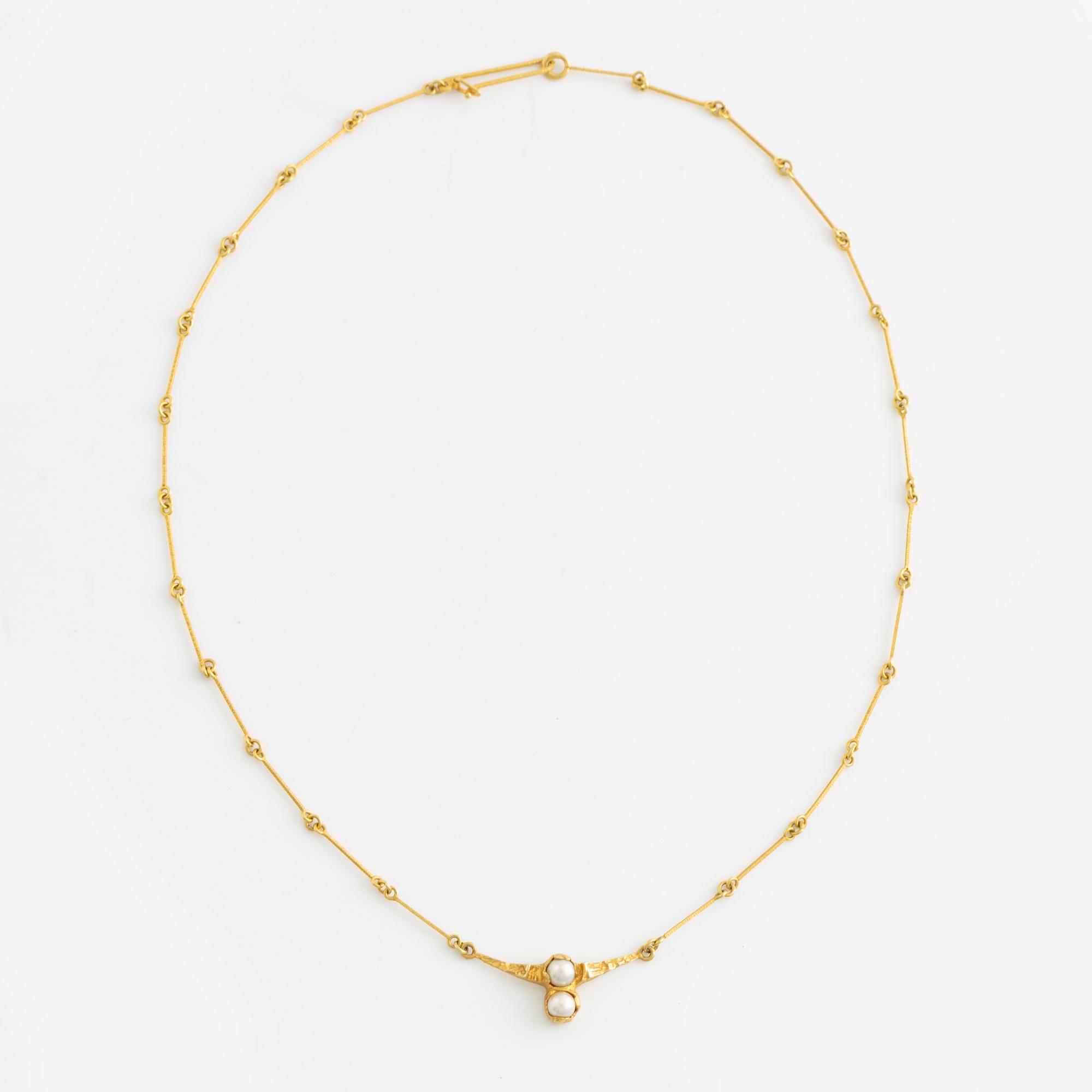 Björn Weckström, collier, "Cheek to cheek", 18K guld med en odlad pärla, Lapponia.