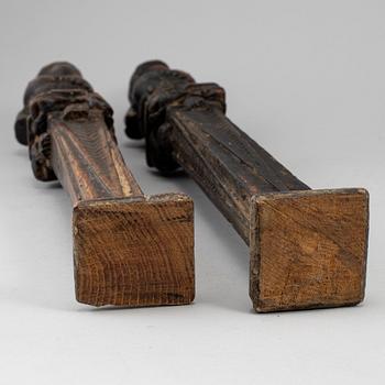 A pair of dark wood balusters, 18th century.