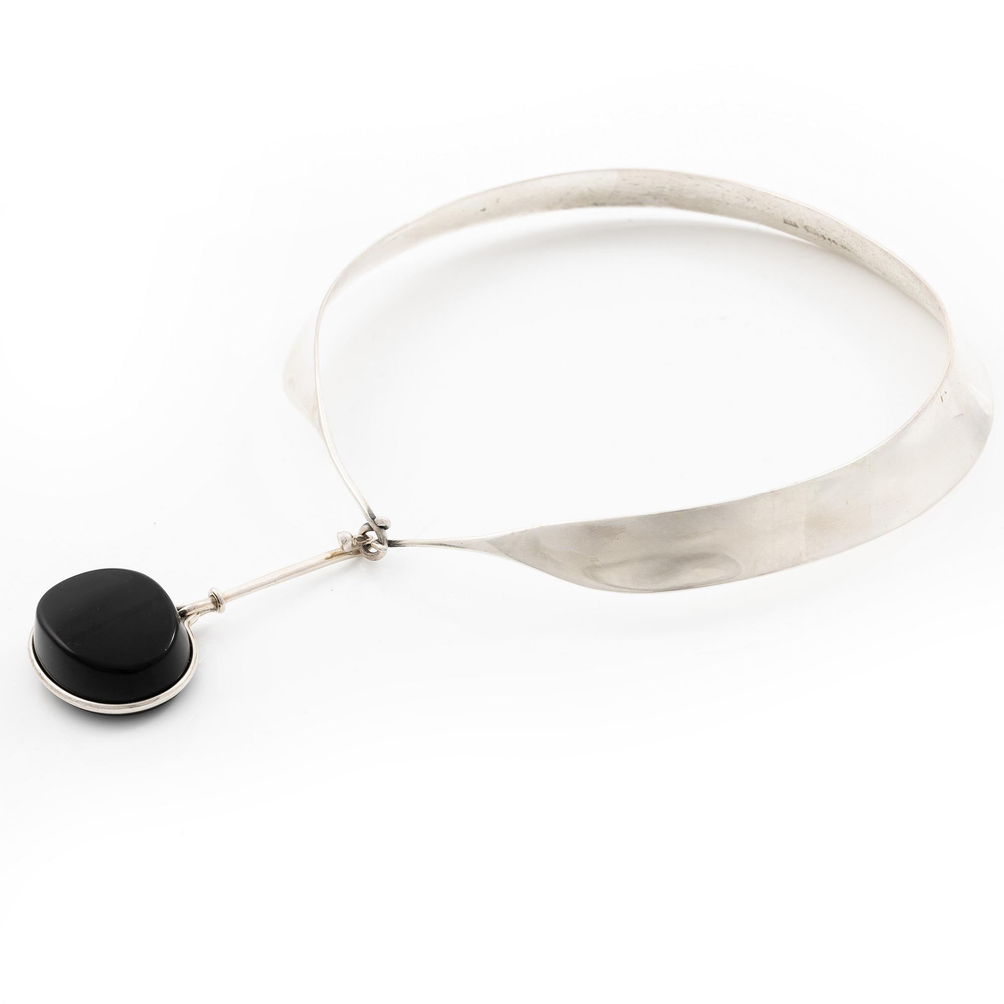 Vivianna Torun Bülow-Hübe, a sterling silver necklace with a obsidian pendant, Georg Jensen, Denmark.