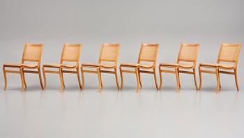 Bruno Mathsson, a set of 6 'Kerstin' beech and rattan chairs, Dux, Sweden, post 1979.