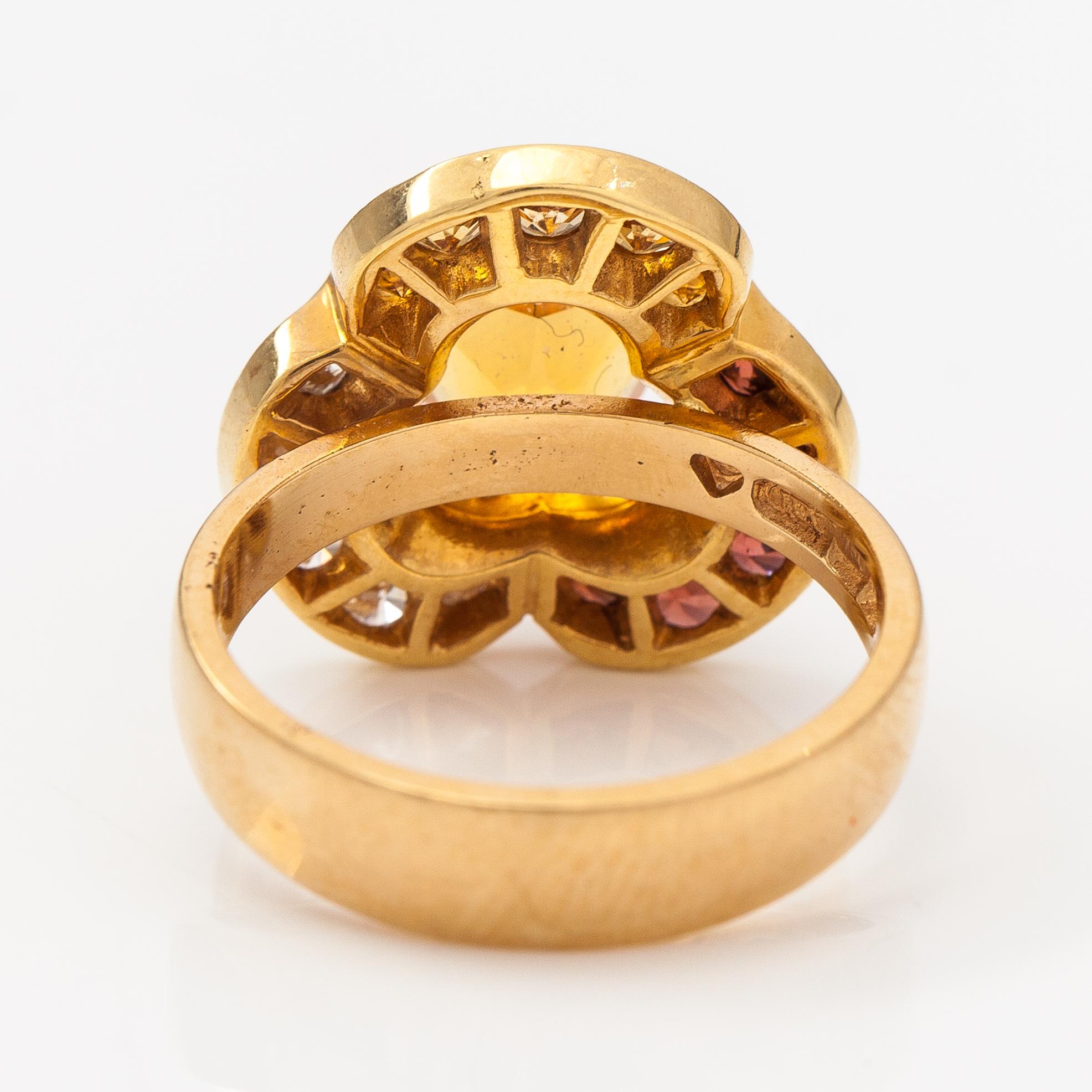 An 18K gold ring "Karin Månsdotter" with citrines and diamonds ca 0.26 ct in total. Ofelia Jewelry, Helsinki 1998.