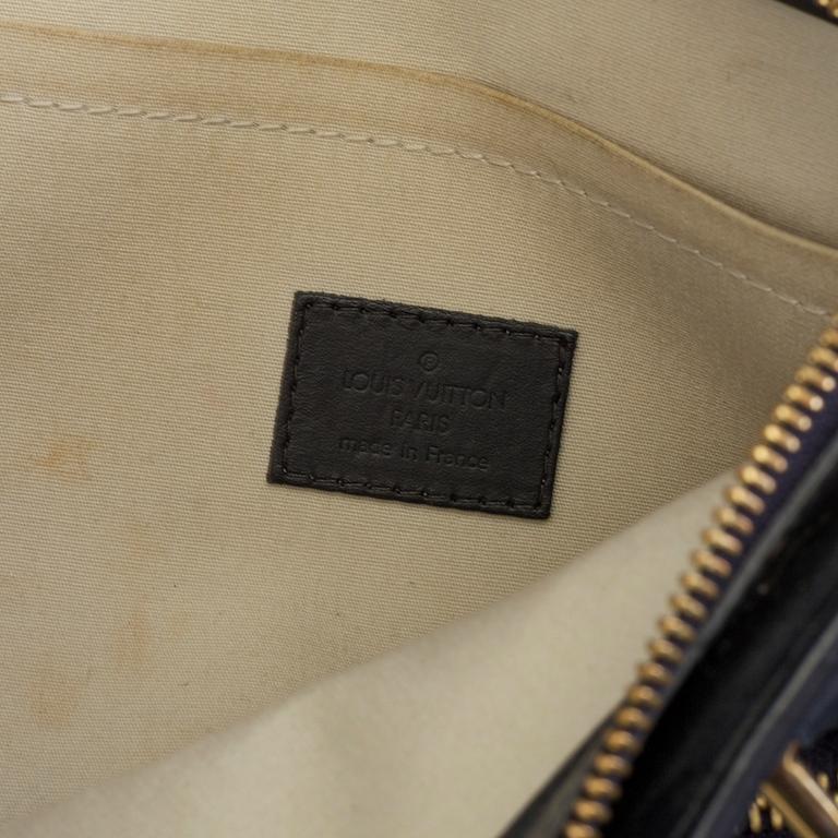 A bag by Louis Vuitton, Monogram Mini Lin Lucille PM Tote.