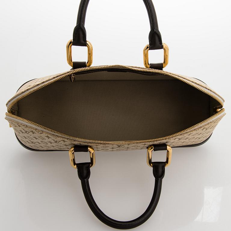 Louis Vuitton, a 'Monogram Mini Lin Alma Long Handbag'.