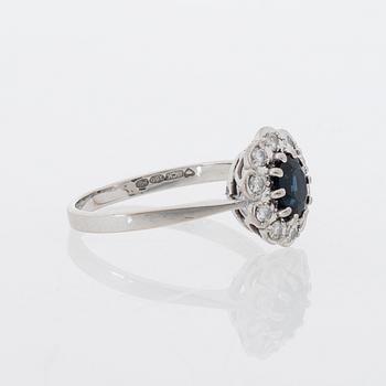 A RING, facetted sapphires, brilliant cut diamonds, 18K white gold. Bismarck-Koru, Helsinki 1985.