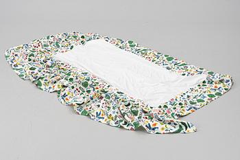 Headboard, upholstered in fabric from Svenskt Tenn.