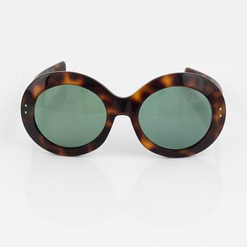 Oliver Goldsmith, a pair of tortoise "Koko" sunglasses.