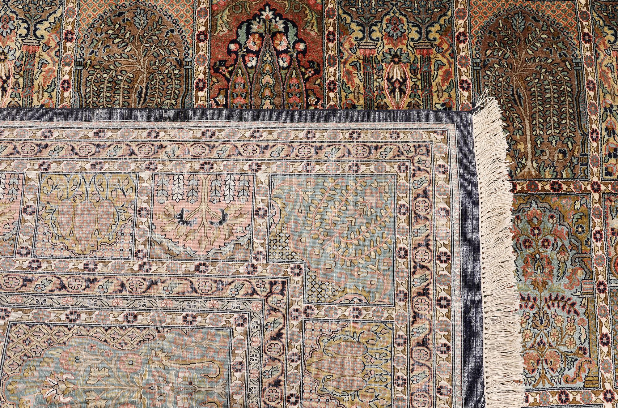 A silk carpet, Kashmir, c. 402 x 300 cm.
