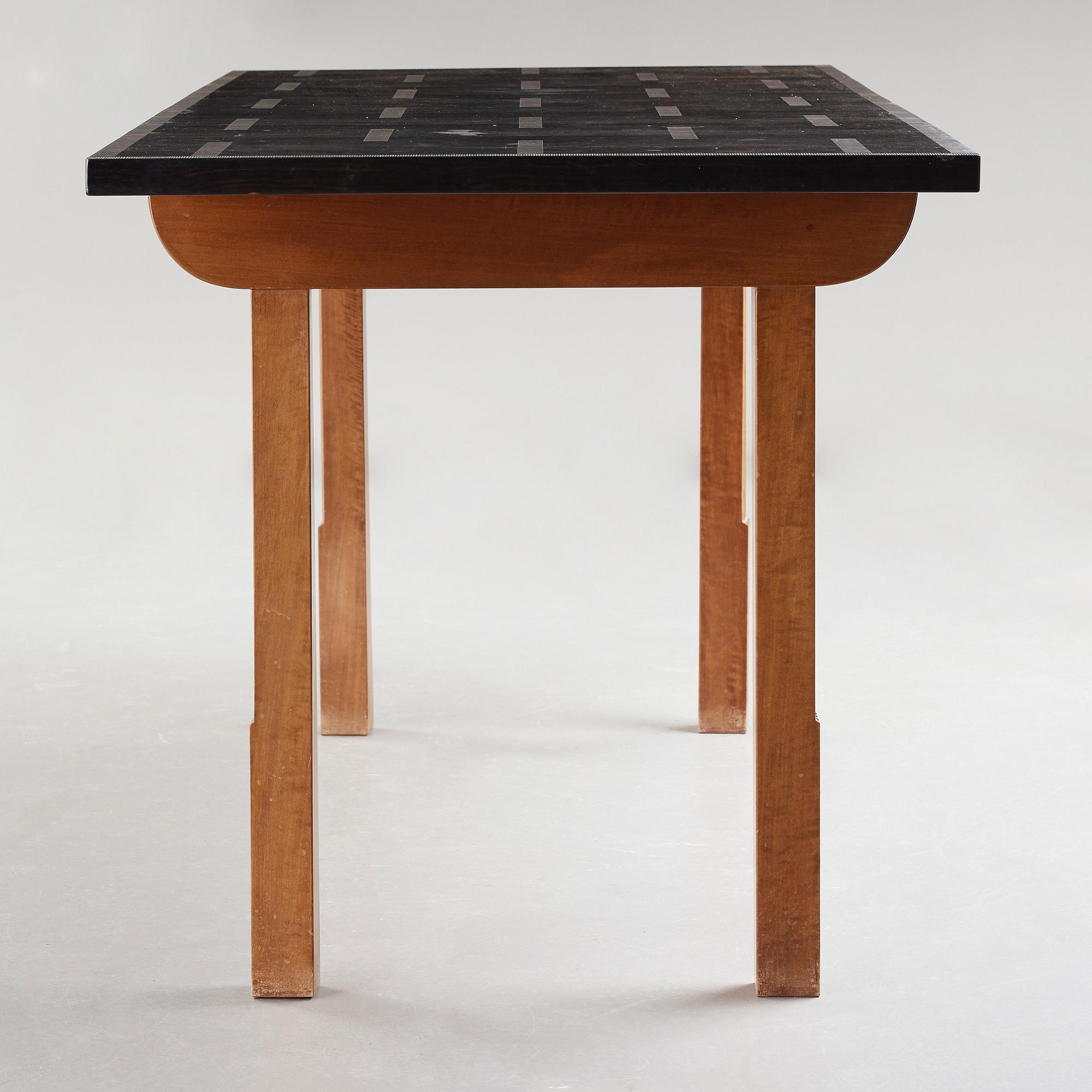 Hjalmar Jackson, A Hjalmar Jackson ebony and pearwood desk/library table, Stockholm ca 1934.