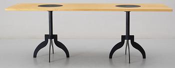 A Jonas Bohlin ash and cast iron dinner table 'Triptyk', by Källemo, Sweden 1989.