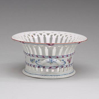 A Russian chesnut basket and stand, Imperial Porcelain Manufactory, St Petersburg, period of Alexander I (1801-25).
