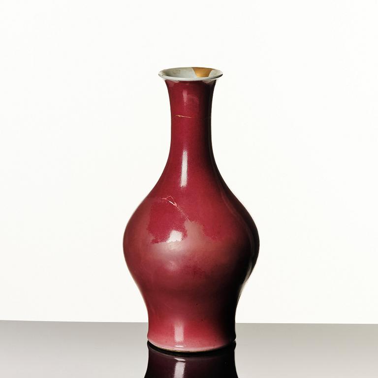 A sang de boef glazed vase, Qing dynasty, 19th Century.