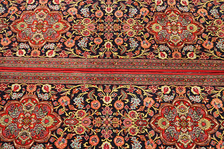 A pair of Quum rugs, c. 176 x 60 cm & c. 178 x 58 cm.