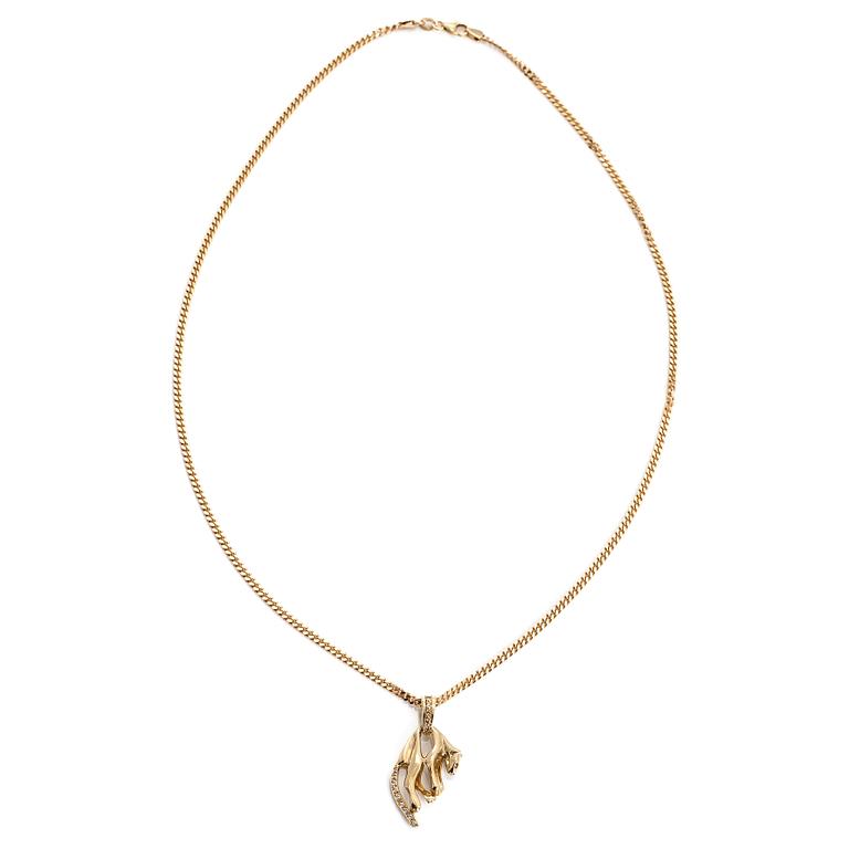A 14K gold necklace with a panther pendant set with white stones.