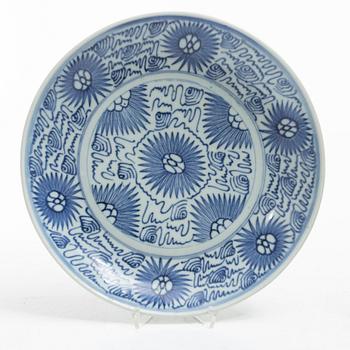 Two similar blue and white porcelain plates, 19th century.
