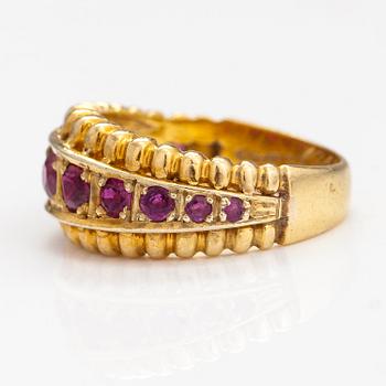 An 18K gold ring with rubies. Italy, finnish import marks.