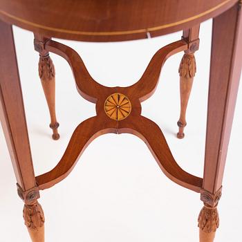 A late Gustavian mahogany table attributed to L. Qvarnberg (master in Stockholm 1801-1813).