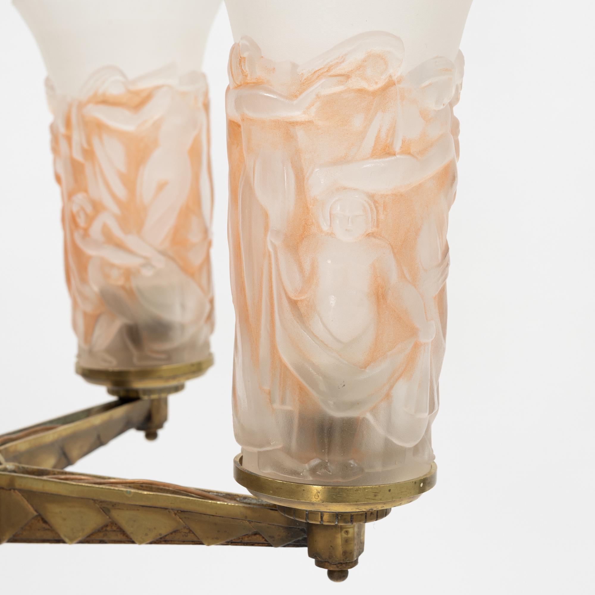 A brass and glass Art Deco ceiling light, probably France, first half of the 20th Century.