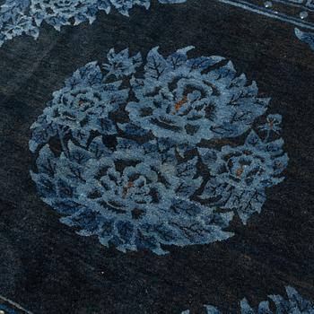 A rug, antique Baotou, approx. 190 x 157 cm.