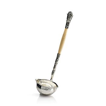 511. Georg Jensen, a sterling silver and ivory gravy ladle, model no 93, Copenhagen, Denmark 1924.
