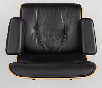 Charles & Ray Eames, Armchair with ottoman, "Lounge chair", Vitra, 21st century.