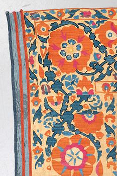 An embroidery, an antique suzani, ca 230 x 169 cm.