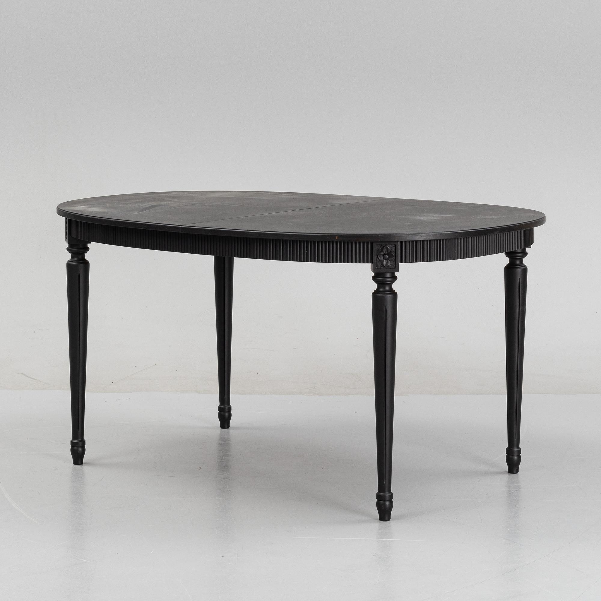 A Gustavians style dining table, second half of the 20th Century.
