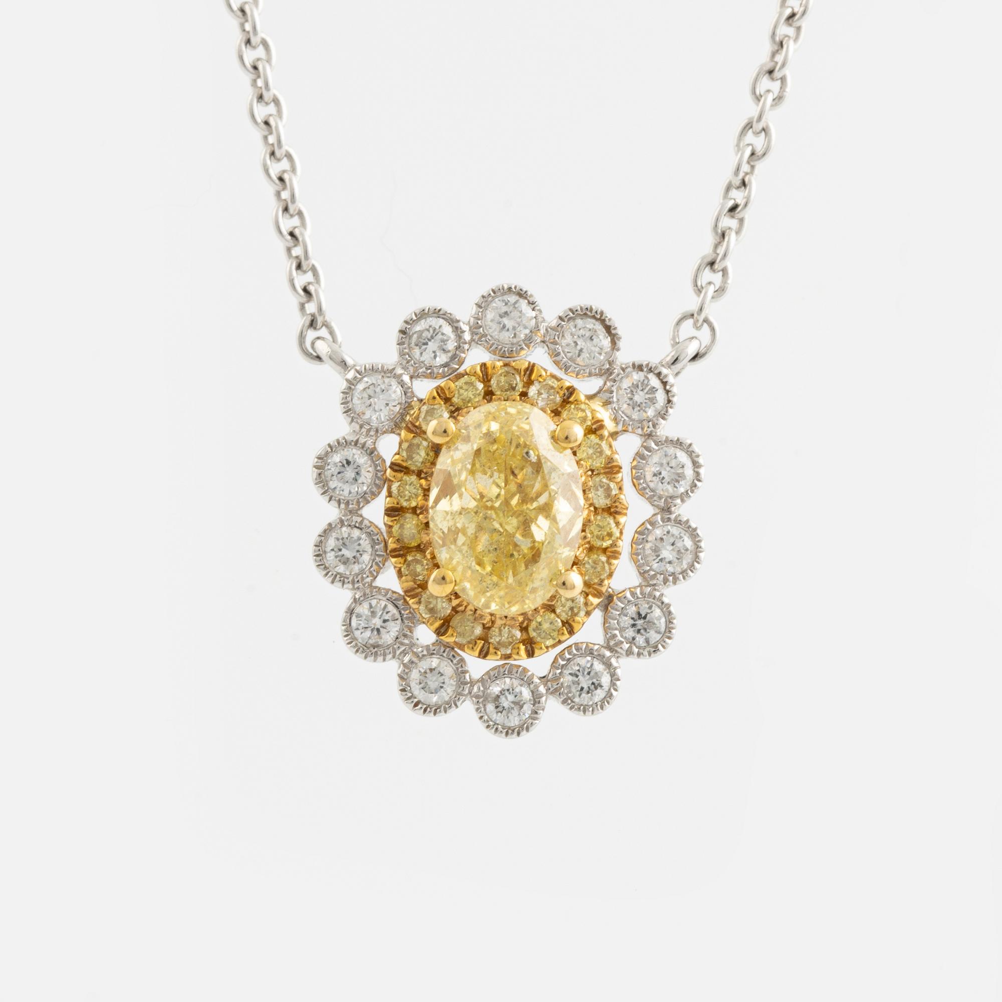 Oval cut yellow diamond and brilliant cut diamond necklace.