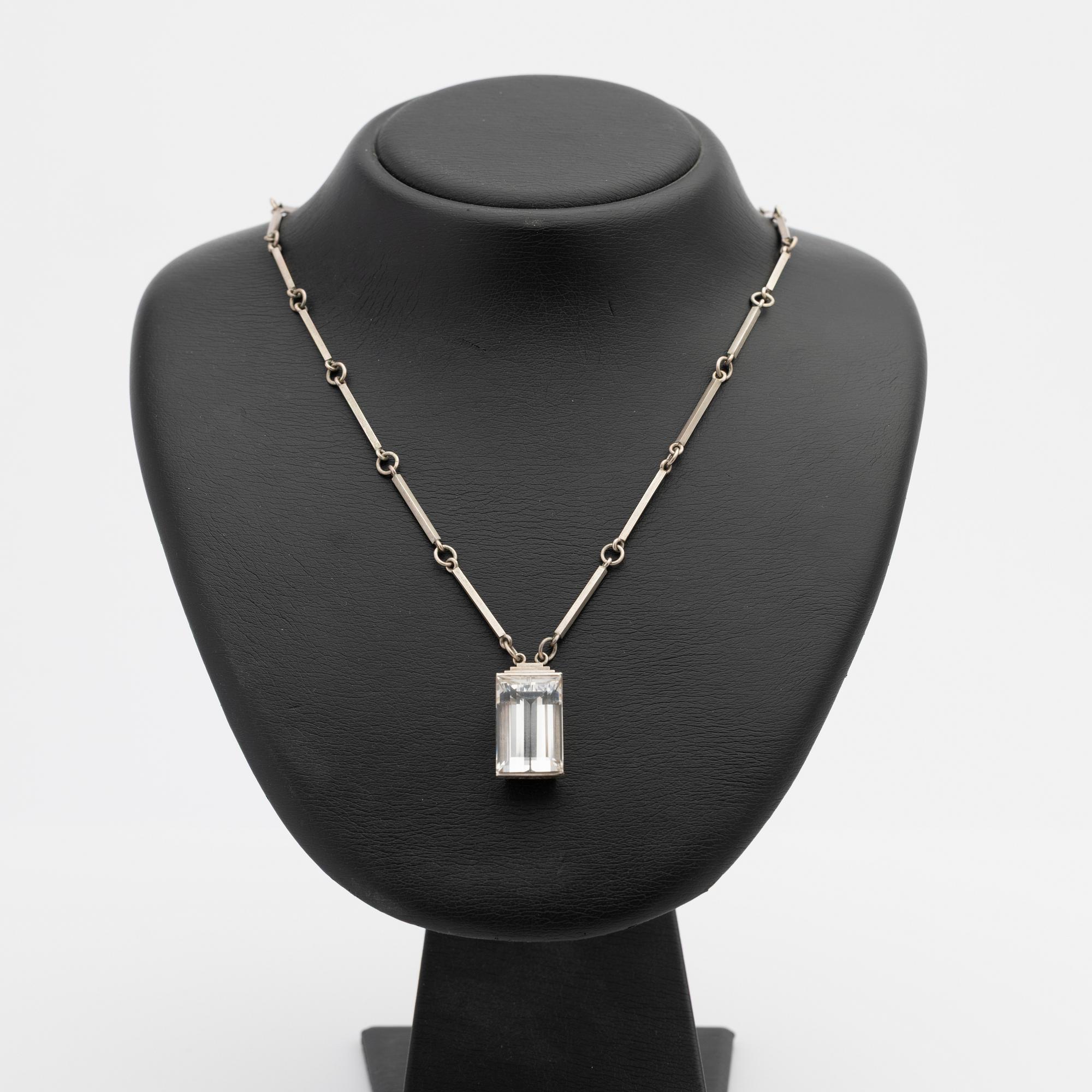 Wiwen Nilsson, Pendant, sterling silver with faceted rock crystal, Lund 1944.